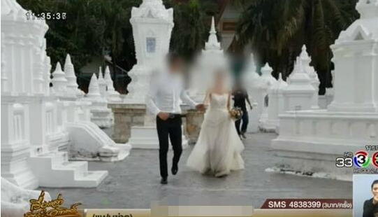 中国情侣在泰国寺庙拍婚纱照