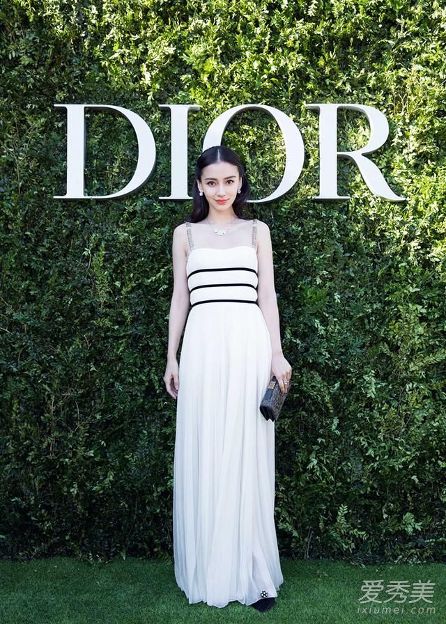 Angelababy亮相巴黎Dior70周年展 身穿吊带白裙优雅而又灵动